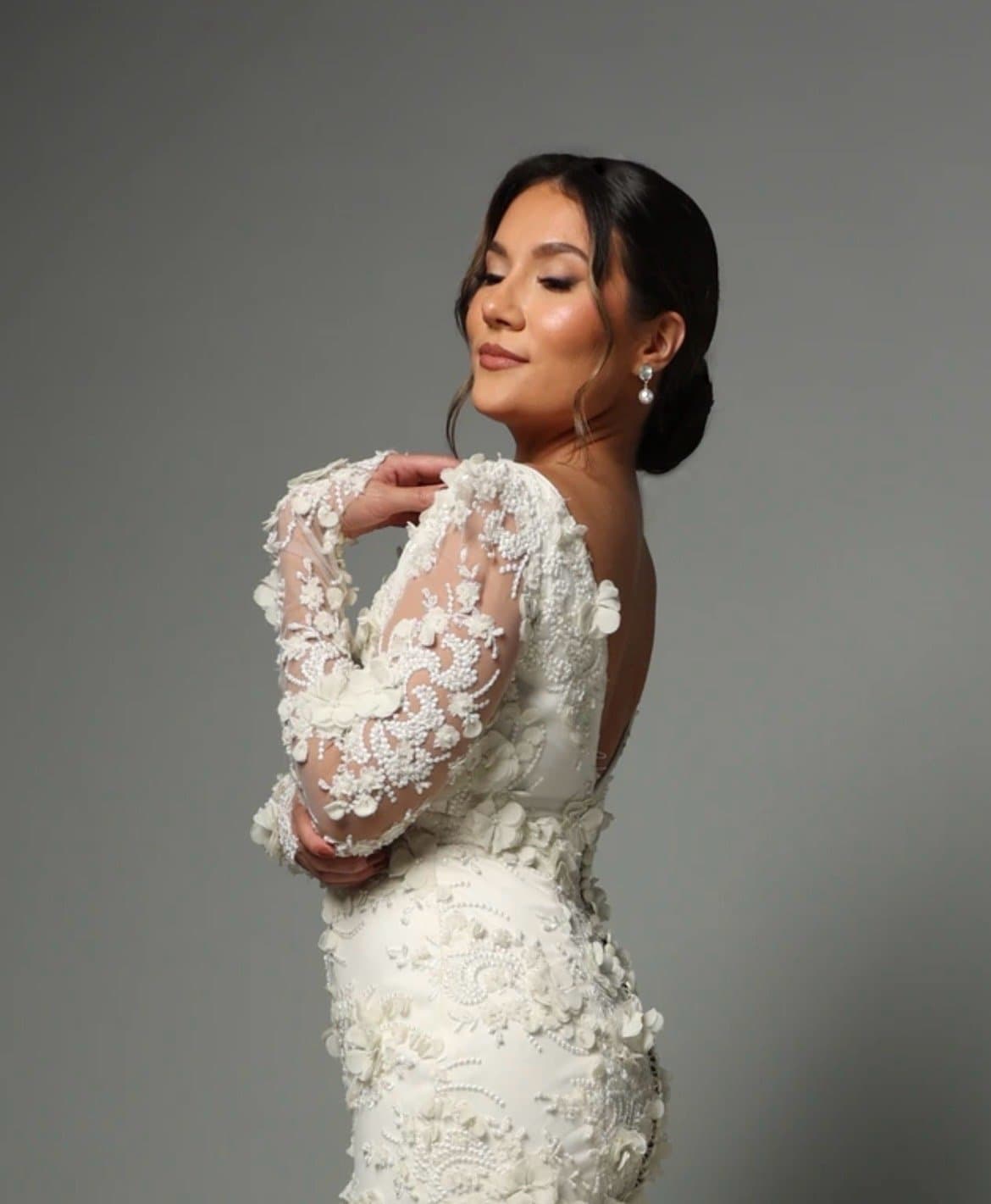 Bride in 3D floral lace gown